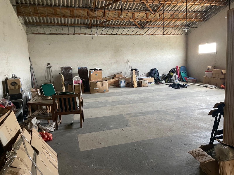 A second view showing the scale of the outbuilding's main room