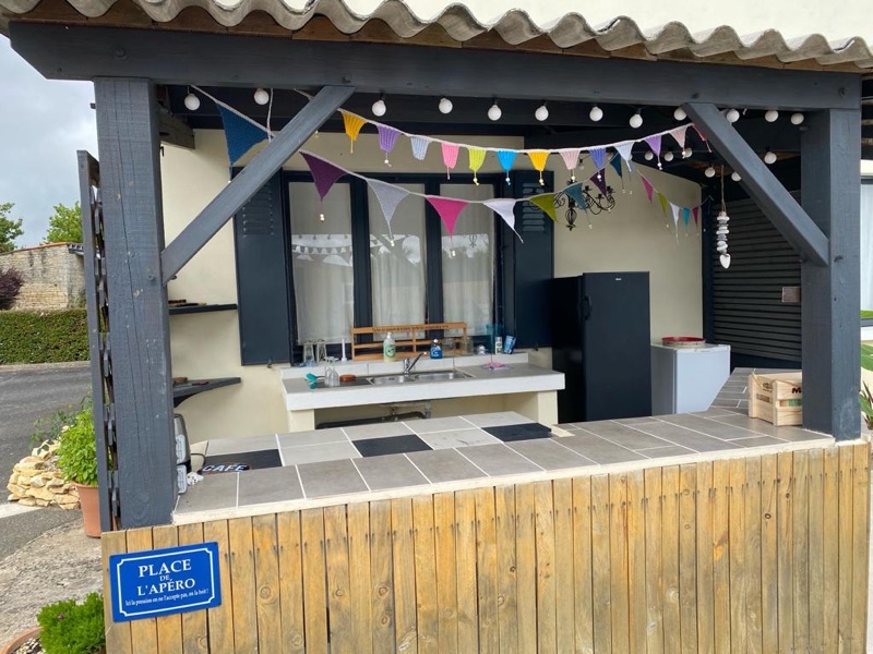 Covered outdoor bar at the Place de l'Apéro